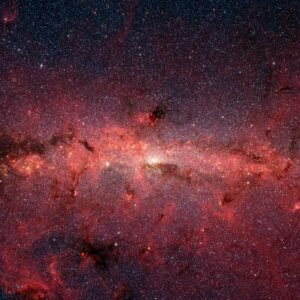 This dazzling infrared image from NASA's Spitzer Space Telescope shows hundreds of thousands of stars crowded into the swirling core of our spiral Milky Way galaxy.